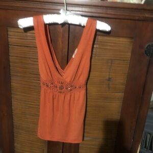 Cotton top with crochet embroidery and embellishments.